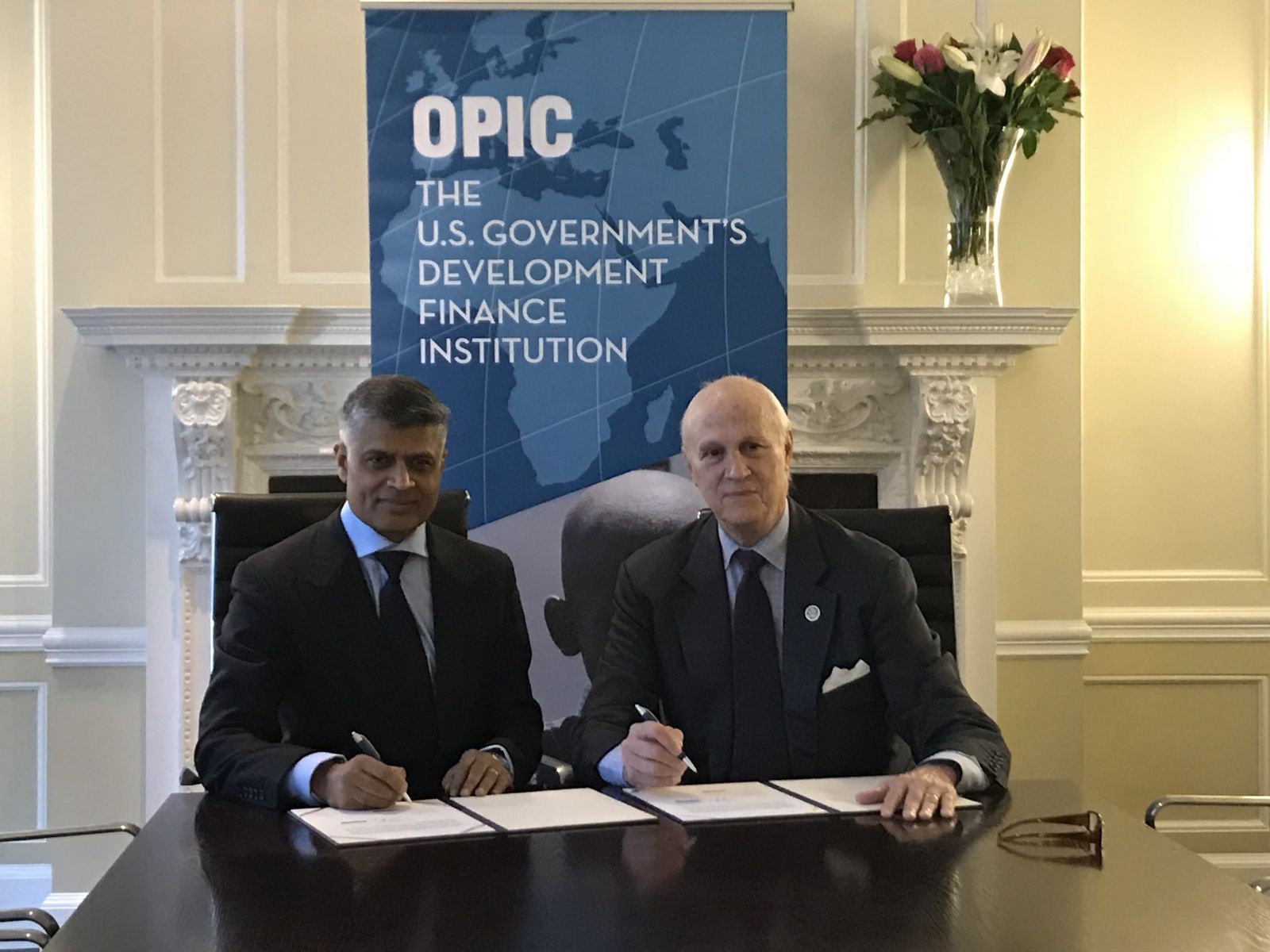 photo Frank Dunlevy and Ketan Patel signing for Greater Pacific Capital, healthcare, energy, technology, agricultural, services, India