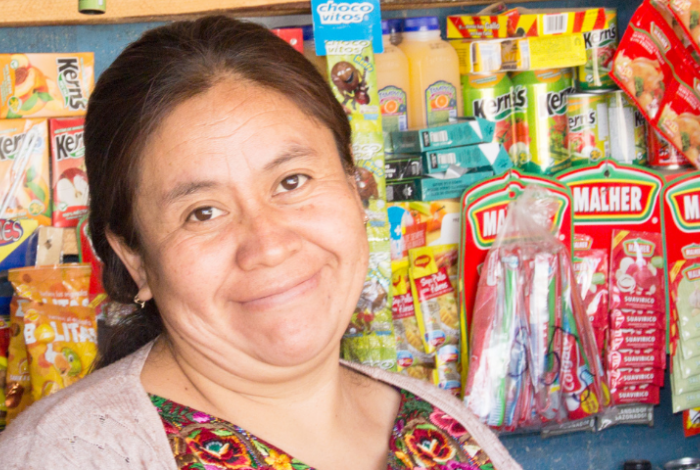 Guatemalan woman smiling in a store