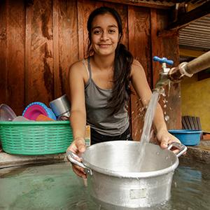 photo, woman washing dishes, Azure, DFC, water security, health