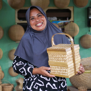 Woman smiling and holding basket